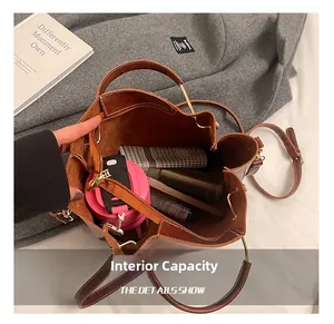Top view of brown leather bucket bag showing large internal capacity for daily items