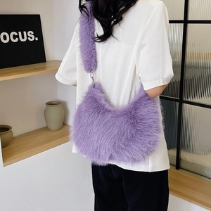 Purple faux fur crescent bag with wide plush strap and silver metal hardware accents