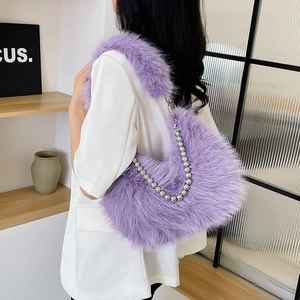 Detail of purple faux fur crossbody bag with silver beaded metal chain and clasp
