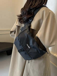 Retro messenger bag in black waterproof nylon with adjustable strap for unisex commuter use