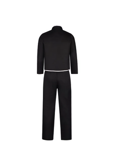 Detail view of the black cosplay jacket and pants set with contrast white piping and trim