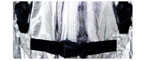 Close-up of silver metallic astronaut suit fabric with black buckle straps and front zipper