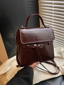 Vintage dunkelbraune Lederhandtasche für Damen mit Klappverschluss und oberem Griff