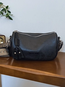 Retro black leather cylinder crossbody bag with vintage ethnic wide shoulder strap
