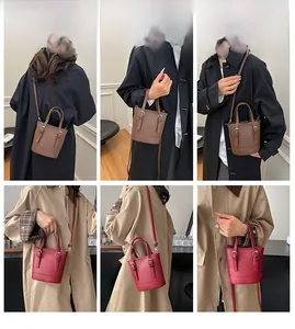 Detail of lychee pattern leather bucket bag showing brown and dark red color options