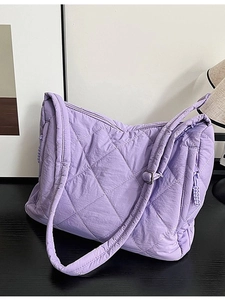 Lavender quilted tote bag with large capacity and matching shoulder strap for daily use