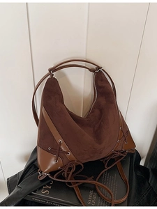 Vintage brown frosted suede hobo bag with fringe tassels and crossbody strap design