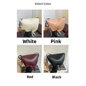 Select color options for the minimalist half-moon shoulder bag in white, pink, red, and black