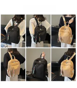 Detail view of large capacity travel backpack with colorful woven straps and dual zipper