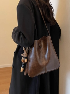 Vintage dark brown faux leather tote bag with a cute rabbit charm for women stylish shoulder bag
