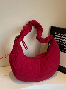 Chic red crescent quilted nylon shoulder bag with stylish scrunchie handle for women