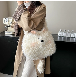 Detail of white plush puppy backpack with fuzzy texture and cute 3D animal face features