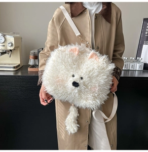Detail of soft white plush Samoyed crossbody bag with fluffy tail and adjustable strap