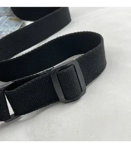 Macro shot of durable black nylon strap with matte adjustable rectangular buckle