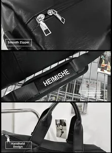 Détail de la double fermeture éclair et de la bandoulière confortable du sac de voyage