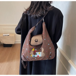 Detail of multi-functional brown polka dot crossbody bag with cute puppy embroidery