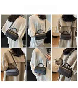 Model showcasing various styling ways of the vintage crossbody handbag in black and brown