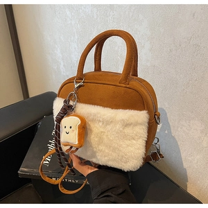 Brown suede crossbody bag with faux fur trim and cute toast plush pendant detail