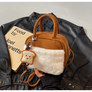 Brown suede and white faux fur crossbody bag with cute smiling toast plush keychain