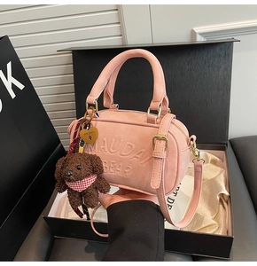 Pink matte Boston handbag in black gift box with cute brown plush bear charm detail