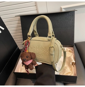 Sage green Boston bag in gift box with cute brown bear charm and shoulder strap
