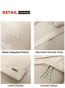 Detail view of water-resistant beige shoulder bag showing strap buckle and zipper