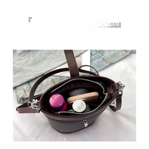 Top view of bucket bag showing large capacity and internal storage for cosmetics