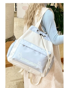 Large capacity blue and white patchwork backpack with drawstrings for daily commute