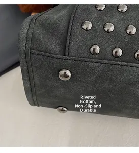 Close-up of bag bottom showing metal rivets for non-slip and wear-resistance