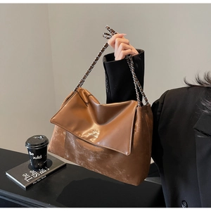 Brown vintage faux leather tote bag with silver chain strap and gold logo detail