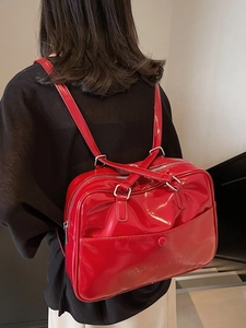 Retro red patent leather backpack for women with high-gloss finish and silver hardware