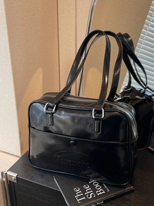 Vintage black faux leather tote bag with glossy finish and Noronoro embossed logo