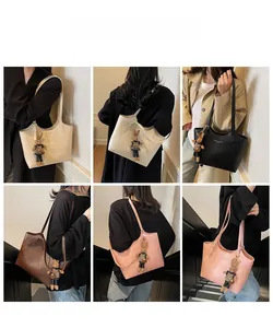 Detailed views of leather tote bags in five colors with cute rabbit charms