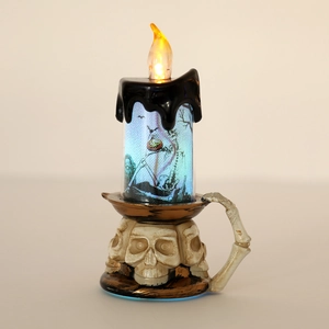 Candela LED scheletro di Halloween con effetto fiamma e base a teschio per decorazioni