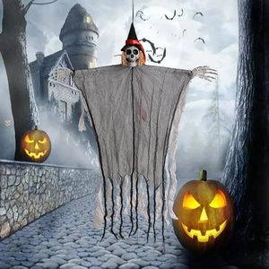Close-up of hanging Halloween skeleton ghost with pointed wizard hat and black gauze robe
