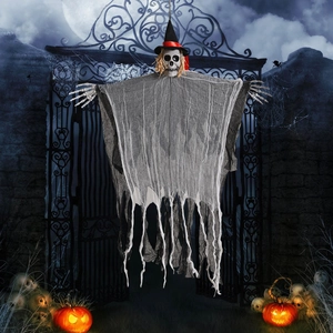 Close-up of a hanging Halloween skeleton ghost with tattered gauze and spooky wizard hat