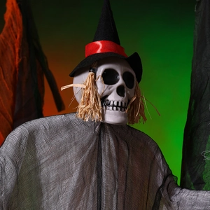 Close-up of Halloween hanging ghost with skull, witch hat and tattered grey gauze detail