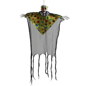 Detail of Halloween clown skeleton hanging prop with tattered black gauze and dots