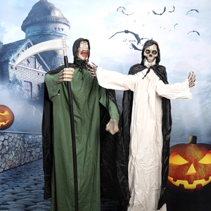 Scary Halloween grim reaper and skeleton props standing in a spooky haunted castle setting