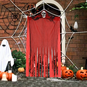 Hanging Halloween ghost decor with red fabric, skull head and black mesh in scary scene