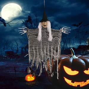 Detailed view of Halloween hanging witch with gauze tattered robe and realistic skull hands