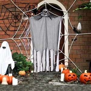 Close-up of hanging skeleton ghost with eye patch and black mesh robe for Halloween decor