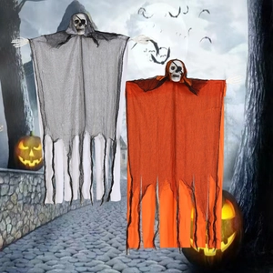 Set of two Halloween hanging ghosts with skull faces and tattered gauze for porch decor