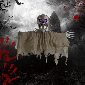Detail of hanging Halloween skull ghost with glowing purple eyes and burlap robe