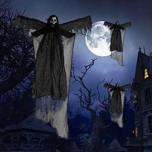 Close-up of hanging Halloween ghosts with glowing red eyes and tattered black robes