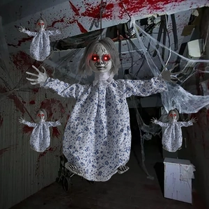 Macro detail of Halloween hanging doll with glowing red eyes and tattered floral dress