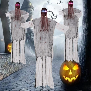 Three hanging ghost decorations with glowing eyes for Halloween party horror scene setup