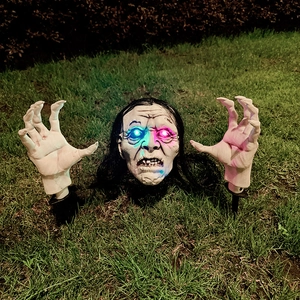 Halloween glowing skeleton ground stakes set with zombie head and hands for yard decoration