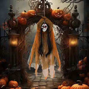 Detail of hanging ghost with bloody skull face and orange tattered gauze decoration