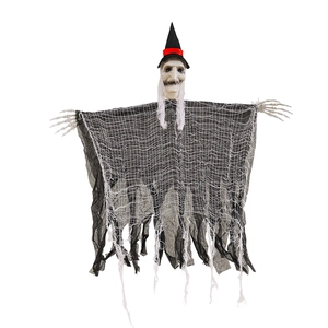 Close-up of Halloween hanging ghost with witch hat, skull hands and tattered fabric